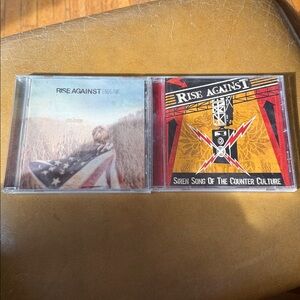 Rise against 2 cds Endgame siren song of the counter culture